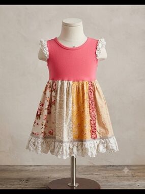 Persnickety patchwork ruffle twirl dress. Made in the USA. 12-18 months.